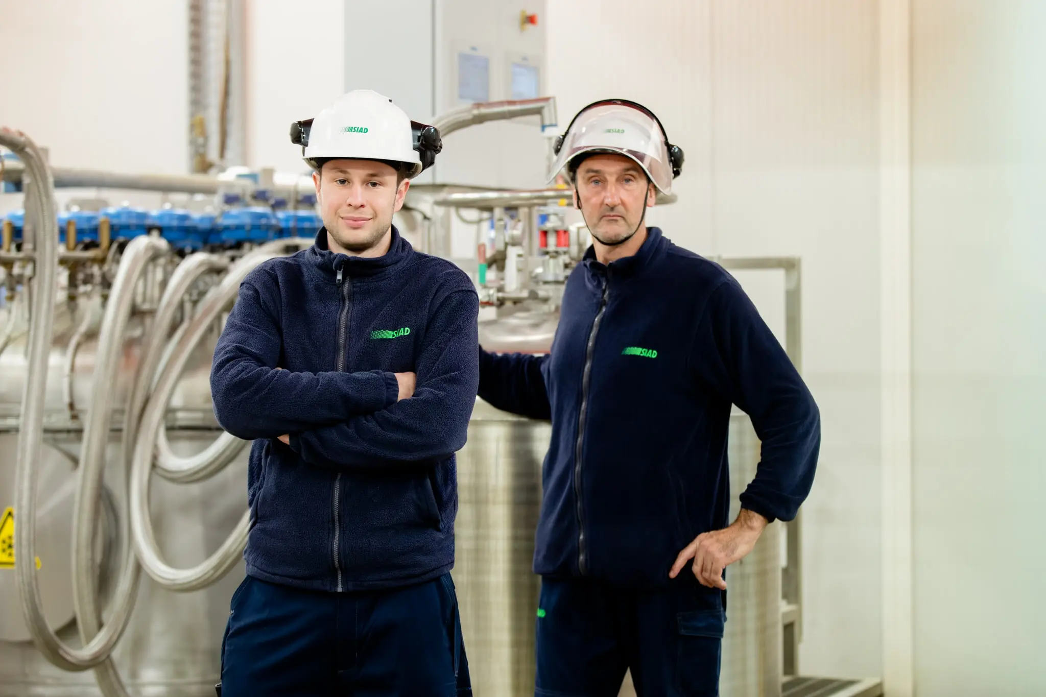 Visual metaphor for authenticity: two employees of SIAD in the Helio facility